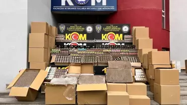 Yüreğir'de Büyük Kaçak Tütün Operasyonu: 700 Bin Makaron ve 1.720 Paket Nargile Tütünü Ele Geçirildi