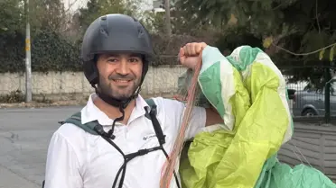 Paraglider Osman Doğan, Çam Dikimi Çalışanlarının Çay Davetini Kabul Etti ve Güvenli İniş Yaptı