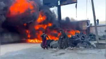 Yangın sonrası yanan lastik yığını